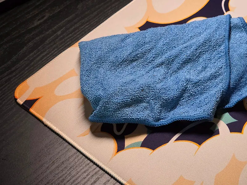 Hoe maak je je muismat schoon?